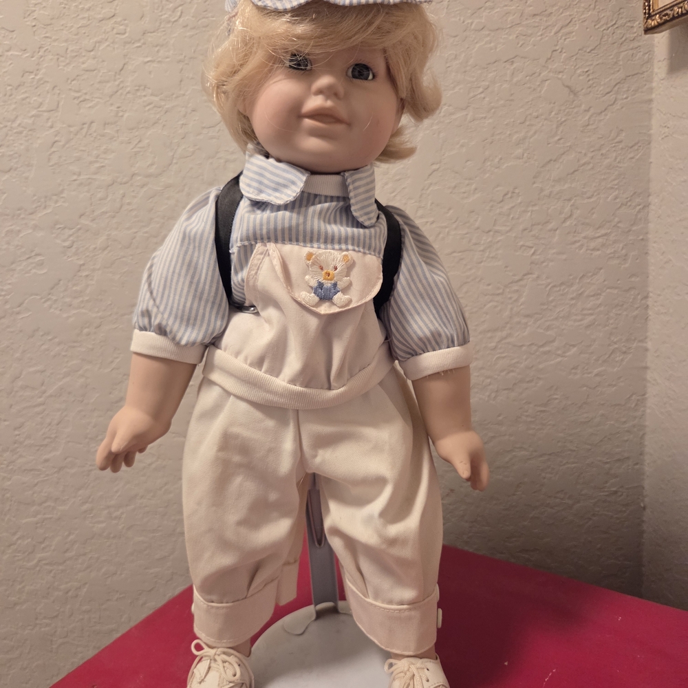 Adorable Doll in Striped Outfit and Cap